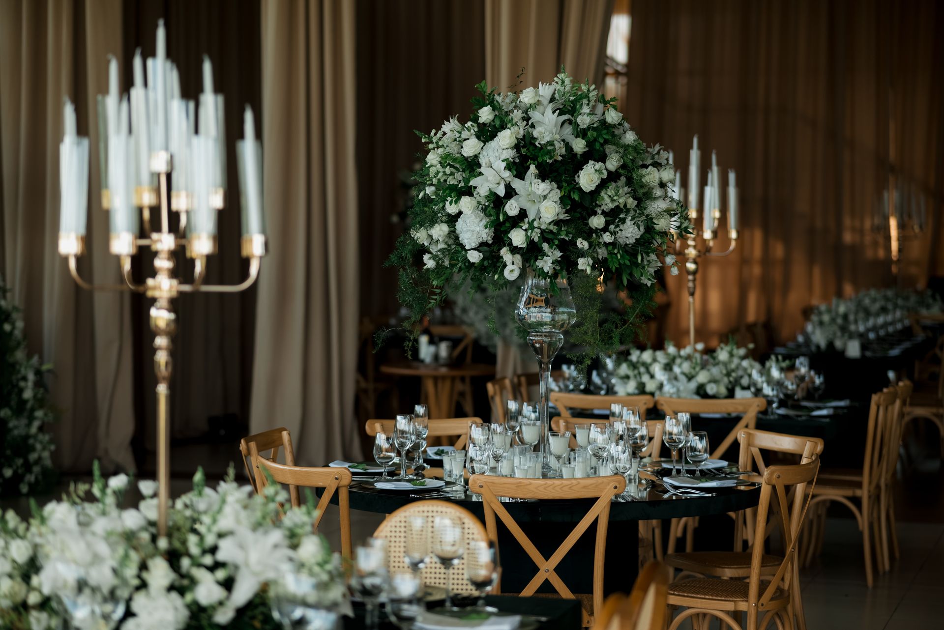 Elegant wedding reception decor with floral arrangements